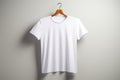 Ai generated white men\'s t-shirt mockup template hanging on a hanger on a light neutral background Royalty Free Stock Photo