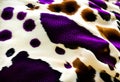 A white and purple spots of a cow skin texture