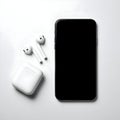 AI-Generated White Wireless Earbuds Case, Earbuds, and Black Smartphone on a White Surface Royalty Free Stock Photo