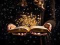 Ai generation. Man opened a magic book with growing lights and magic powder. Christmas reading concept. Royalty Free Stock Photo