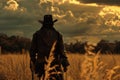 ai generative cowboy on the grassland back view Royalty Free Stock Photo