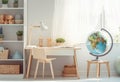 Ai generative. Back to school. Kids bedroom with wooden desk, books, globe Royalty Free Stock Photo