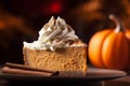 pumpkin pie with a dollop of whipped cream