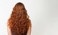 Ai generative. Rear view of a girl with beautiful long red hair
