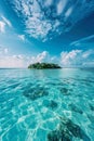 a small cute island in a turquoise clear ocean Royalty Free Stock Photo