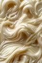 Swirls of creamy condiment texture, possibly mayonnaise or cream. Royalty Free Stock Photo