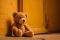 Ai Generative Teddy bear sitting on the floor in front of a yellow wall
