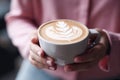 Ai generative. Woman hands with cup of coffee with latte art