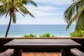 Ai generative. Wooden table looking out to tropical ocean Royalty Free Stock Photo