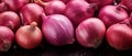 AI illustration of a closeup of a pile of pink onions.