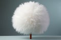 AI illustration of a large, white, fluffy ball on a small brown stick.