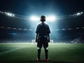 AI illustration of a young soccer player standing on a grass field of a stadium. Royalty Free Stock Photo