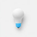 AI image White lightbulb with blue base against a neutral background for an illuminated concept Royalty Free Stock Photo