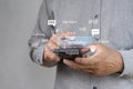 AI-Powered Language Translate App Concept. A person holds smartphone displaying an AI powered language