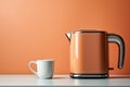 sixties style orange electric kettle and cup of coffee