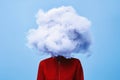 Surreal portrait of the woman with head hiding in a cloud Royalty Free Stock Photo