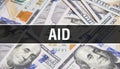 Aid text Concept Closeup. American Dollars Cash Money,3D rendering. Aid at Dollar Banknote. Financial USA money banknote