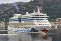 The AIDA Luna Cruise Ship enters Bergen Port and begins to turn so as to come alongside the Quay.