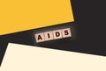 AIDS letters on wooden cubes. STD sexually transmitted diseases