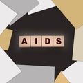 AIDS letters on wooden cubes. STD sexually transmitted diseases