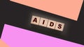 AIDS letters on wooden cubes. STD sexually transmitted diseases