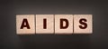 AIDS letters on wooden cubes. STD sexually transmitted diseases