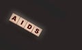 AIDS letters on wooden cubes. STD sexually transmitted diseases