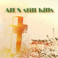 Aids still kills written with cross gravestone. Information concept.