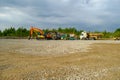 Aidu, Estonia - August 27, 2023: A lot of different tractors have gathered in one place. Quarry heavy tractor equipment Royalty Free Stock Photo