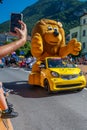 Aigle, Valais Canton, Switzerland -10.07.2022: Passage of an advertising car of yellow jersey LCL in the caravan of the Tour de