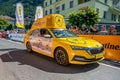 Aigle, Valais Canton, Switzerland -10.07.2022: Passage of an advertising car of yellow jersey LCL in the caravan of the Tour de