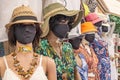 Mannequins wearing hats and face masks in the south of France.