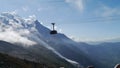 Aiguille de Chamonix cable car ascending to the Aiguille de Midi and Mont Blanc in France.
