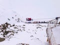 Chamonix Mont-Blanc high lift station, skiers go skiing