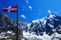 Aiguille du midi mountain and flying flag seen from Plan de l`Aiguille, French Alps Royalty Free Stock Photo