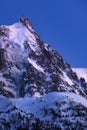 Aiguille du Midi needle at twilight. Mont Blanc mountain range, Chamonix, Haute-Savoie, France Royalty Free Stock Photo