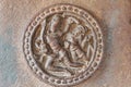 2 figures in circular sculpture Aihole Karnataka India