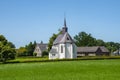 Aijen, Netherlands - Juky 18, 2021: Tiny church in the village Aijen, province Noord Limburg, Netherlands