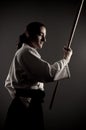 Aikido man with a stick