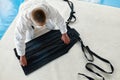 Aikido sensei folding kimono hakama after training class