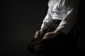 Aikido Hakama Sitting Pose Over Black Royalty Free Stock Photo