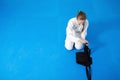 An aikidoka girl folding her hakama for Aikido Royalty Free Stock Photo