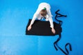 An aikidoka girl folding her hakama for Aikido training Royalty Free Stock Photo