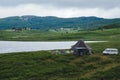 Ail traditional Altaic houses and tourist tents around on the lake shore Royalty Free Stock Photo