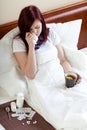 Ailing woman drinking tea