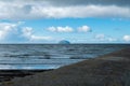 Ailsa Craig & Cloudy Skys from Girvan Harbour in Scotland Royalty Free Stock Photo