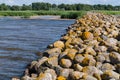 Ainazi North pier stones covered by yellow moss Royalty Free Stock Photo