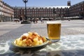 Aioli and bravas potatoes in Plaza Mayor in Madrid, Spain