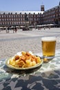 Aioli and bravas potatoes in Plaza Mayor in Madrid, Spain