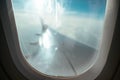 Aiplane windows view on aircraft wing from the cabin, skyline transportation